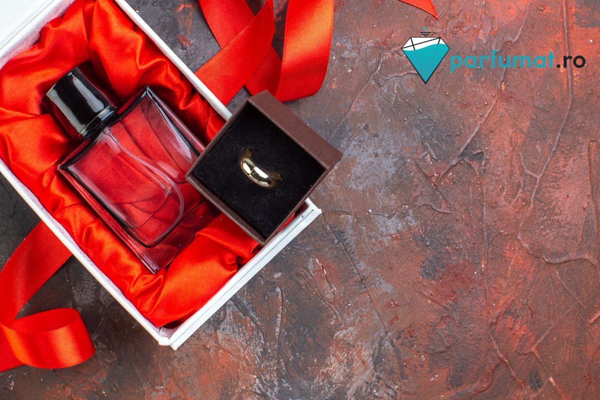 top view valentines day present fragnance on dark background gif